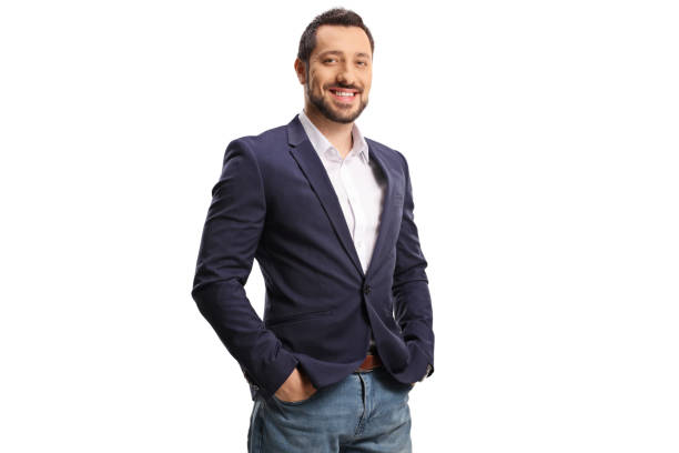 istock Young man in jeans and suit posing with hands in pockets 1330838990