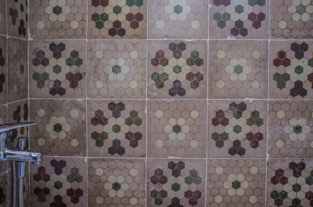 istock Vintage rural hotel bathroom covered with old cement tile 1330845866