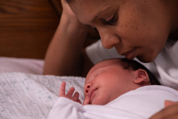 istock Mom and new born baby. 1330847789