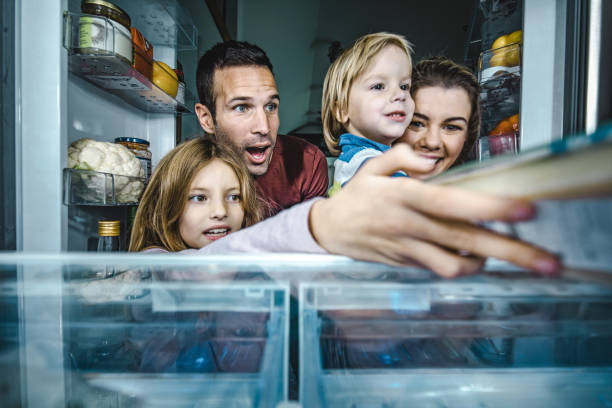 istock Let's pick something to eat from a fridge! 1330854691
