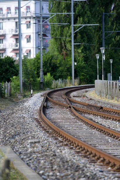 istock Railway track switch at train station Interlaken West on a sunny summer afternoon. 1330854905