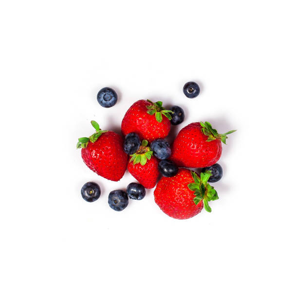 istock Strawberry and blueberry isolated on white background 1330857850