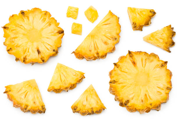 istock sliced pineapple isolated on white background. exotic fruit. clipping path. top view 1330859107
