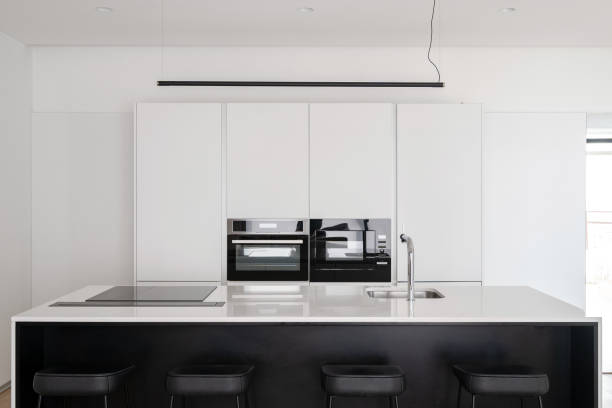 istock Kitchen counter and cupboard with built in equipment 1330866576