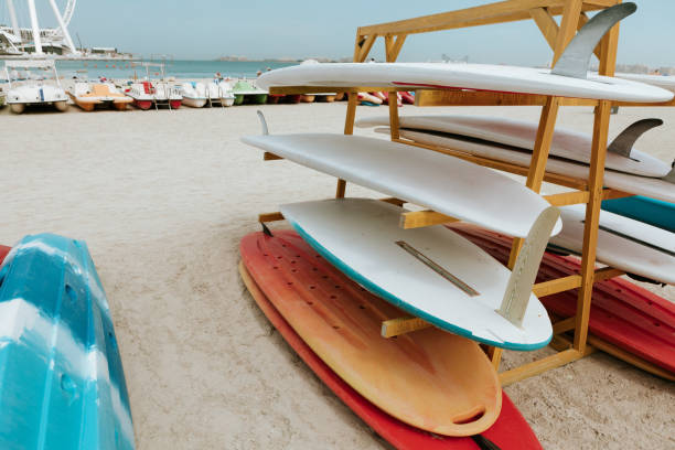 istock Surfboards stacked on the rack on a beach 1330870842