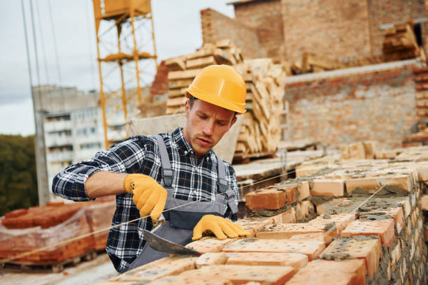 istock Construction worker in uniform and safety equipment have job on building 1330871179