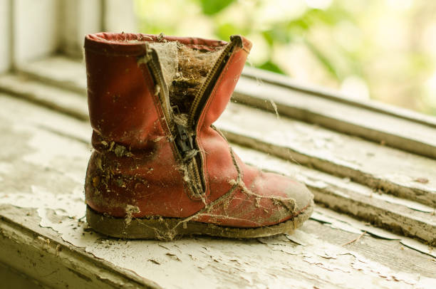 Lost old, dirty, used retro shoe.