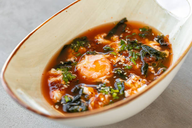 istock Asian noodle soup in bowl on gray background 1330871725