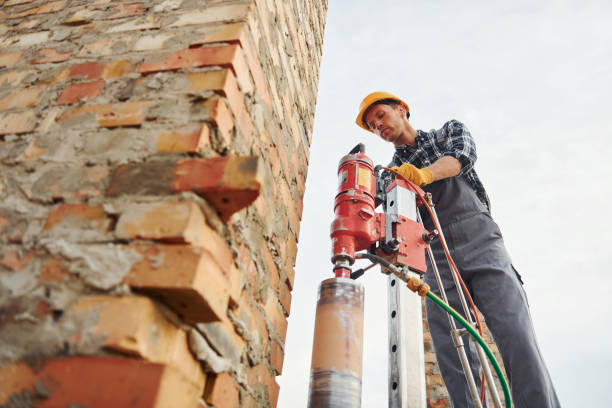 istock Uses blending drill. Construction worker in uniform and safety equipment have job on building 1330872926