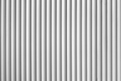Closely spaced white lacquered wooden strips pattern background