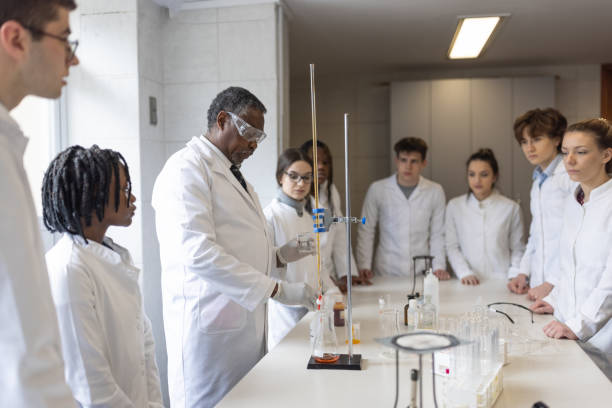 istock Group of High school students in chemistry class 1330878567