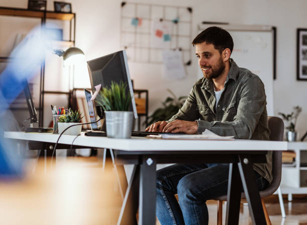 istock One businessman working from home on laptop, dealing with finances 1330879891