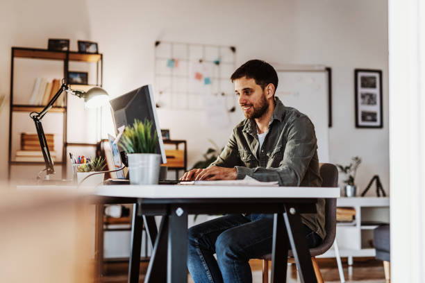 istock One businessman working from home on laptop, dealing with finances 1330880999