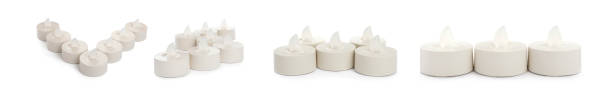 istock Set with decorative flameless LED candles on white background. Banner design 1330881841