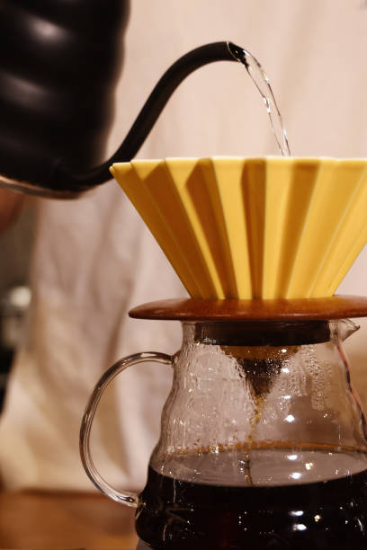 istock Barista at work in a cafe. Preparing pour over coffee 1330884091