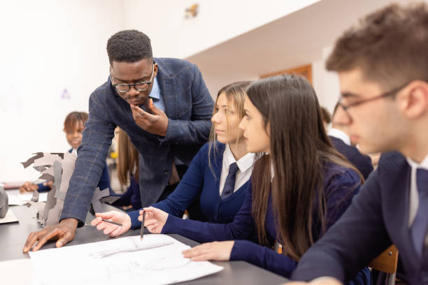 istock High school students  and teacher on art class at school 1330885782