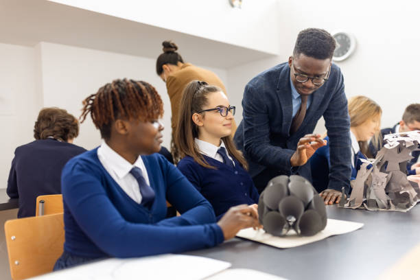 istock High school students  and teacher on art class at school 1330885790