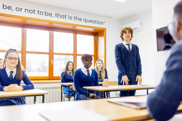 istock High School Teacher and Students In Classroom 1330885834