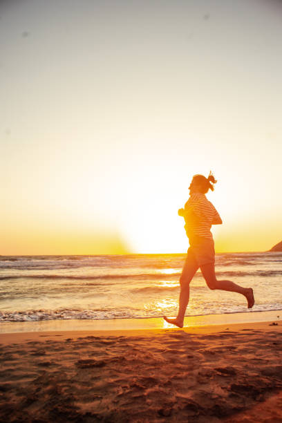 istock Running and realxing by the sea 1330890664