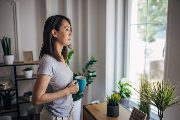 istock Japanese woman at home 1330890759