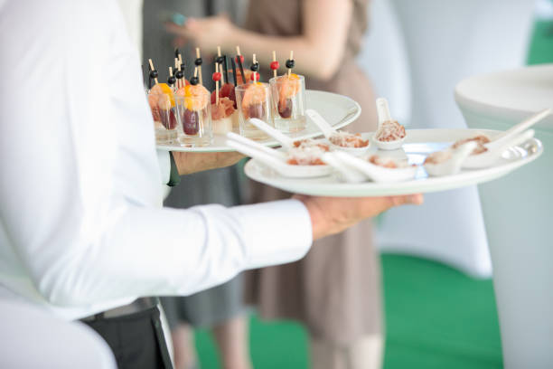 istock Waiter carrying plates with appetizers on some festive event, party or wedding 1330891329