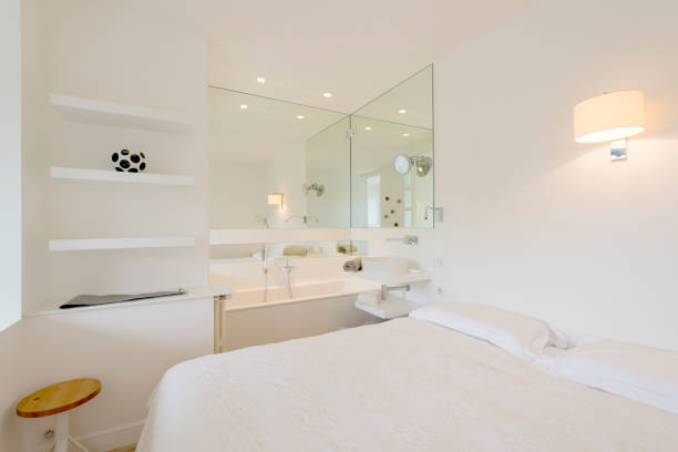 istock A bedroom in a luxury home with a bathtub in it 1330893478