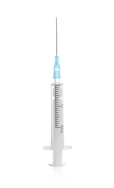 istock Disposable syringe with needle isolated on white 1330893584