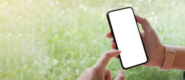 istock woman using Smartphone. Blank screen mobile phone for graphic display montage.networking service. 1330895377