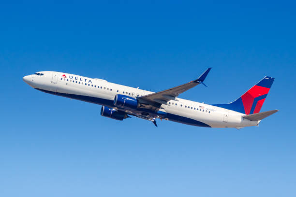 Delta Air Lines Boeing 737-900ER airplane New York JFK Airport in the United States New York City, New York - March 1, 2020: Delta Air Lines Boeing 737-900ER airplane at New York JFK Airport in the United States. boeing 737 photos stock pictures, royalty-free photos & images
