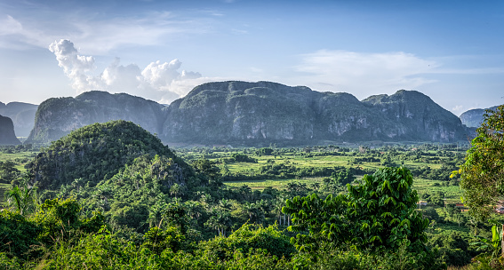 panoramic aerial view of the mogotes of viñalles valley at sunset in Cuba