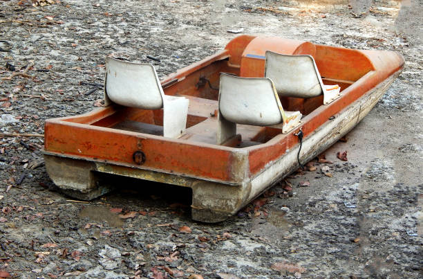 istock paddle boat in a dried water tank 1330904114