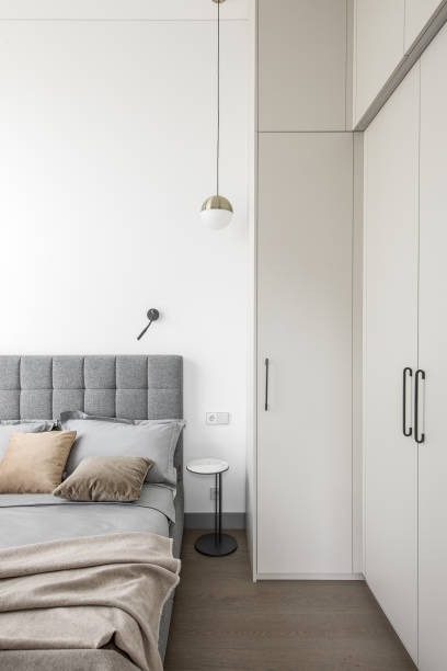 istock Modern Minimalism Style Bedroom Interior In Beige  and grey Tones 1330906041