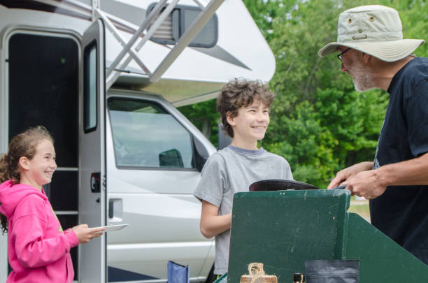 istock Father cooking on camping stove 1330907159