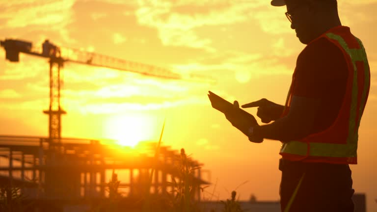 Construction Site With Crane at sunset