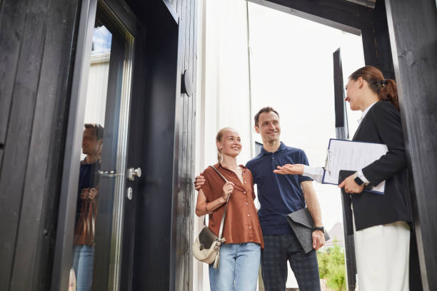 istock Couple Meeting Real Estate Agent 1330910838