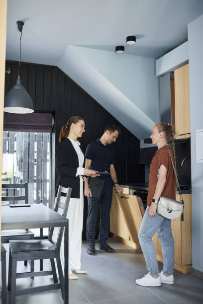 istock Young Couple at House Tour 1330910857