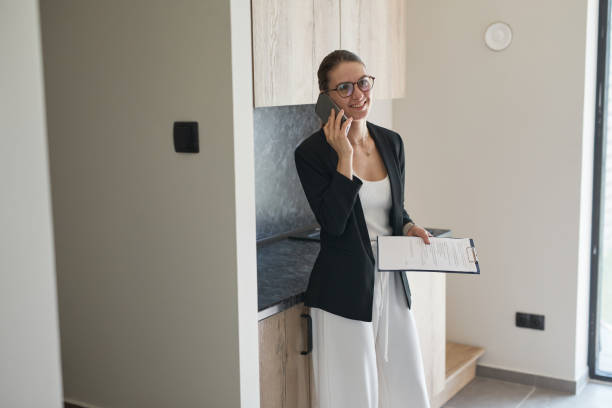 istock Real Estate Agent Calling by Smartphone 1330910986