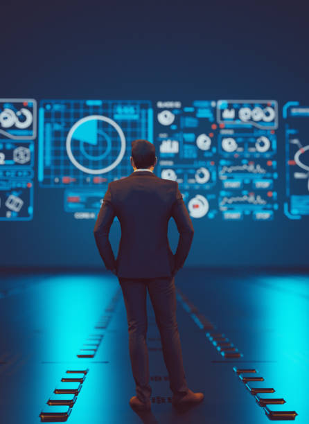 Wathcing big data analysis on hologram screen with symbols Man stands in front of a big hologram screen which has different symbols. He is analyzing data. Concept of data analysis and data complexity. cloud complexity stock pictures, royalty-free photos & images