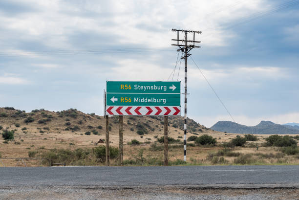 istock Directional sign at Schoombee on road R56 1330915185