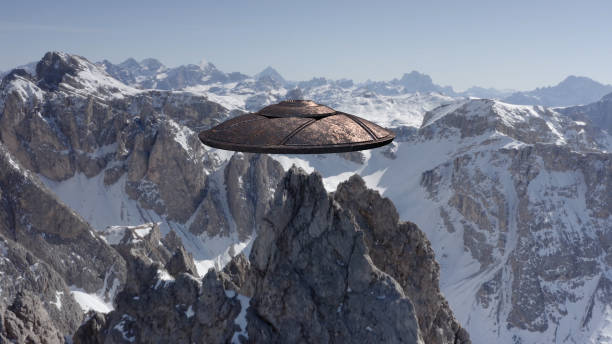 istock Flying Saucer Ufo Hovering Above The Alps Peak, Aerial 1330920628