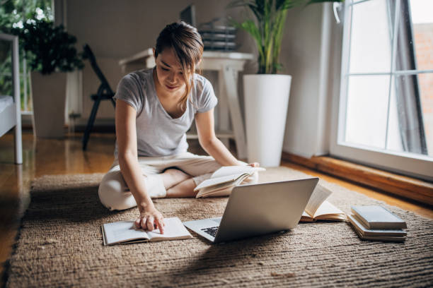 istock Japanese woman studying at home 1330921528