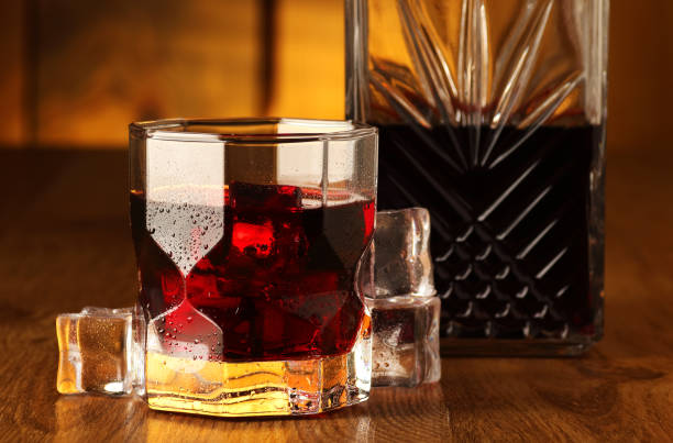 istock glass full of alcohol with ice cubes 1330922206