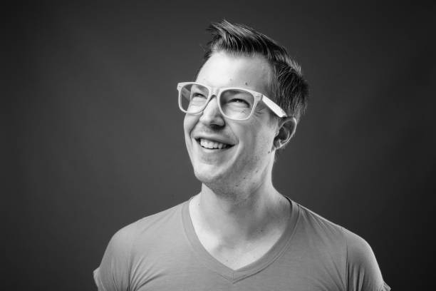 istock Young handsome man with eyeglasses in black and white 1330925870