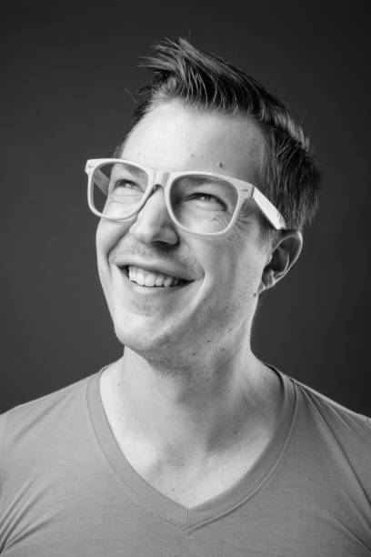 istock Young handsome man with eyeglasses in black and white 1330925922