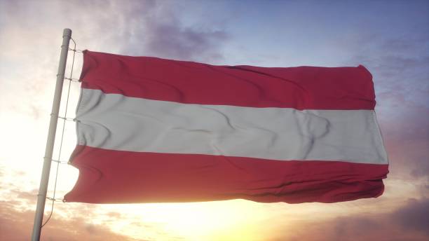 istock Flag of Austria waving in the wind, sky and sun background. 3d rendering 1330925933
