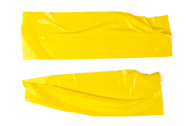 istock Set of yellow tapes on white background 1330926109