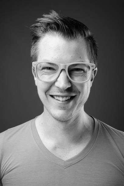 istock Young handsome man with eyeglasses in black and white 1330927068