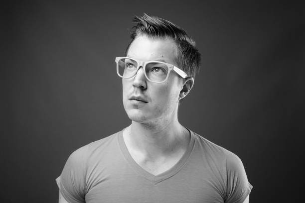 istock Young handsome man with eyeglasses in black and white 1330927101