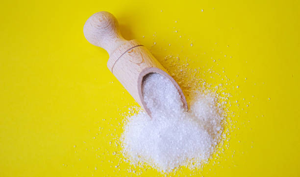 istock Citric acid on a yellow background. Selective focus. 1330929794