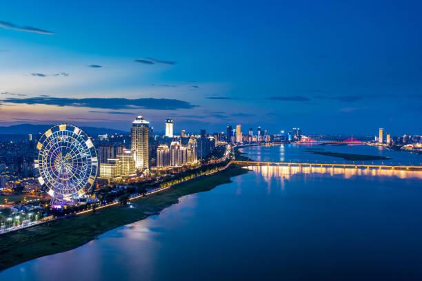 istock China city night skyline, river and buildings 1330931781